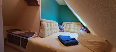 Ein Bett oder Betten in einem Zimmer der Unterkunft Ferienhof Leuner