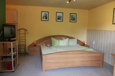 Ein Bett oder Betten in einem Zimmer der Unterkunft Ferienhof Leuner