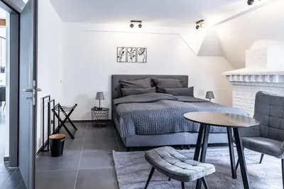 Ein Sitzbereich in der Unterkunft Elbflorenz Familien Suites