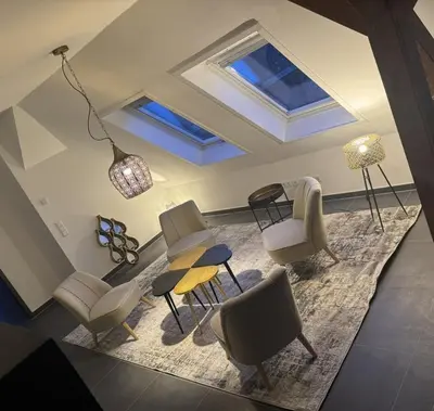 Ein Sitzbereich in der Unterkunft Elbflorenz Familien Suites