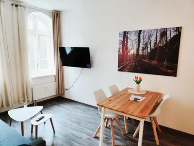 TV/Unterhaltungsangebot in der Unterkunft F1B - Urlaubsmagie - Helle Wohnung mit Sauna und Pool