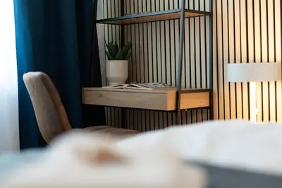 Ein Bett oder Betten in einem Zimmer der Unterkunft Benville Freital - 2 Schlafzimmer - Wohnküche - WLAN