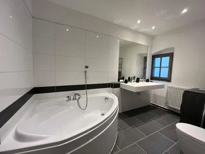 Ein Badezimmer in der Unterkunft Reihenhaus Elbquartier mit 3 SZ