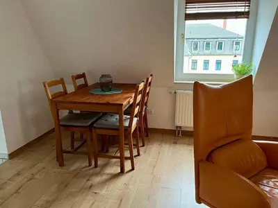 Ein Sitzbereich in der Unterkunft Ferienwohnung für 5 Personen