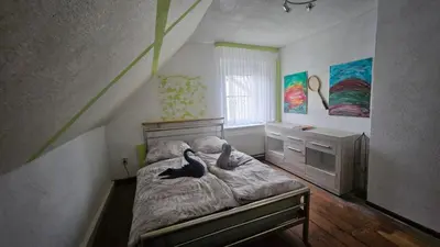 Ein Bett oder Betten in einem Zimmer der Unterkunft Zur Alten Post