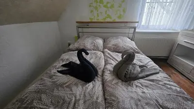 Ein Bett oder Betten in einem Zimmer der Unterkunft Zur Alten Post