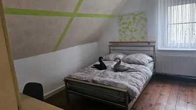 Ein Bett oder Betten in einem Zimmer der Unterkunft Zur Alten Post