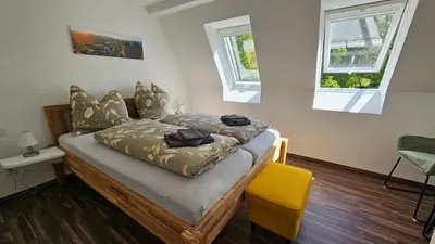 Ein Bett oder Betten in einem Zimmer der Unterkunft Ferienwohnung An der Seidewitz - keine Monteure
