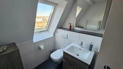 Ein Badezimmer in der Unterkunft Ferienwohnung An der Seidewitz - keine Monteure