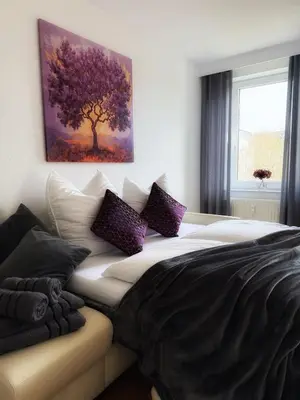 Ein Bett oder Betten in einem Zimmer der Unterkunft Carrée 31 Balkon, Privatparkplatz, Aufzug, Kaffee