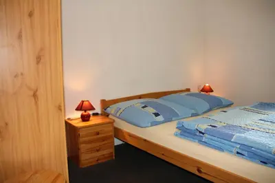 Ein Bett oder Betten in einem Zimmer der Unterkunft Pension Haus Pentacon