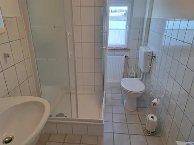 Ein Badezimmer in der Unterkunft Pension Haus Pentacon
