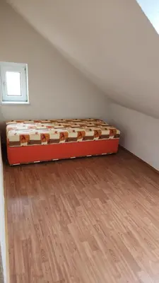 Ein Bett oder Betten in einem Zimmer der Unterkunft Pension 7-Eichen 44