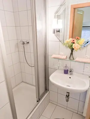 Ein Badezimmer in der Unterkunft L4 - Urlaubsmagie - Kleine Wohnung am Wanderweg