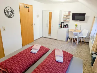 Ein Bett oder Betten in einem Zimmer der Unterkunft L4 - Urlaubsmagie - Kleine Wohnung am Wanderweg