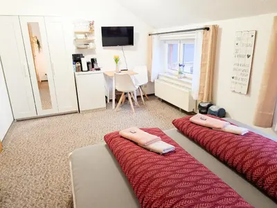 Ein Bett oder Betten in einem Zimmer der Unterkunft L4 - Urlaubsmagie - Kleine Wohnung am Wanderweg