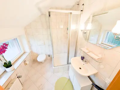 Ein Badezimmer in der Unterkunft L7 - Urlaubsmagie - Kleine Wohnung am Wanderweg