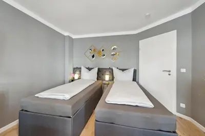 Ein Bett oder Betten in einem Zimmer der Unterkunft DresdenStay gemütlich und modern mit Kamin und PS4