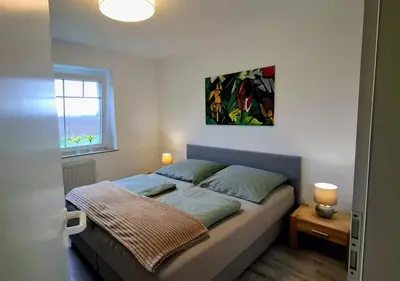 Ein Bett oder Betten in einem Zimmer der Unterkunft 30 qm Fewo ländliche Lage Nossen