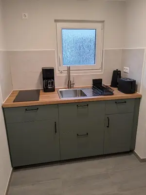 Küche/Küchenzeile in der Unterkunft Ferienwohnung Sydom