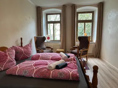 Ein Bett oder Betten in einem Zimmer der Unterkunft Privatzimmer in 4 Zimmer EG Wohnung in Altchemnitz