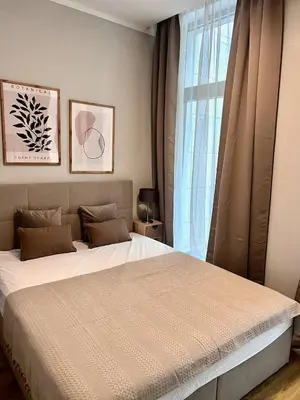 Ein Bett oder Betten in einem Zimmer der Unterkunft Cozy Voyage - Frauenkirche 2 - Ruhig und Zentral