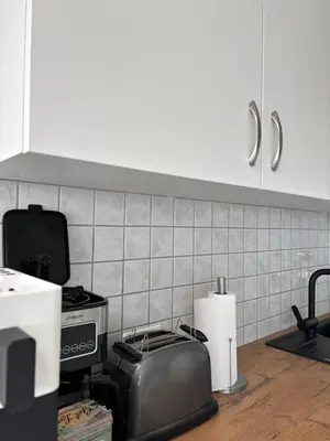 Küche/Küchenzeile in der Unterkunft Zentrales, modernes Apartment mit Balkon, Küche & Garage