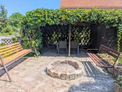 Ein Garten an der Unterkunft CASA BENJI - Familienfreundliche FeWo - Landhausstil - Garten - Parkplatz