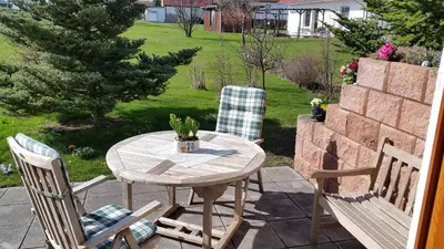 Ein Garten an der Unterkunft Ferienwohnung Glückswiese
