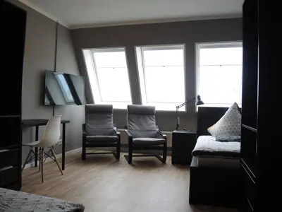 Ein Sitzbereich in der Unterkunft Apartment I Lausitzring I BASF