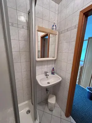 Ein Badezimmer in der Unterkunft Pension Schwesinger