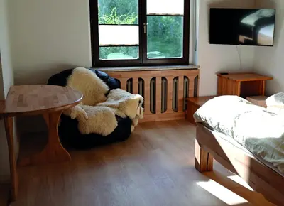 Ein Bett oder Betten in einem Zimmer der Unterkunft Pension Sonne Hartha