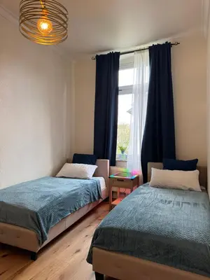 Ein Bett oder Betten in einem Zimmer der Unterkunft NewCityHome - Chemnitz - 2 Zi - Design Apartment Naomi - Kaßberg - Private Parking