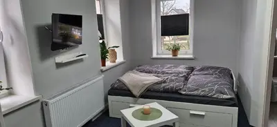 Ein Bett oder Betten in einem Zimmer der Unterkunft Ferienwohnung Schwalbennest1