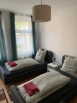 Ein Bett oder Betten in einem Zimmer der Unterkunft Gablenz-Apartment VI - ideal für 4 Personen