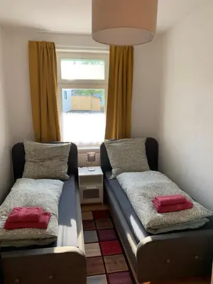 Ein Bett oder Betten in einem Zimmer der Unterkunft Gablenz-Apartment VI - ideal für 4 Personen