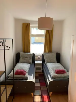 Ein Bett oder Betten in einem Zimmer der Unterkunft Gablenz-Apartment VI - ideal für 4 Personen