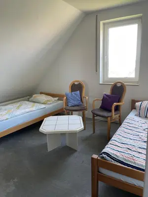 Ein Bett oder Betten in einem Zimmer der Unterkunft Gästehaus Silke