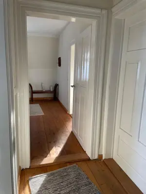 Ein Bett oder Betten in einem Zimmer der Unterkunft Stadtvilla Oscar 2 OG - Stilvoll sanierte Altbauwohnung in denkmalgeschützter Stadtvilla nahe Elbradweg