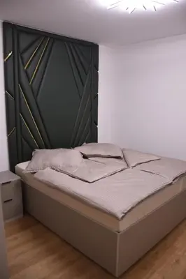 Ein Bett oder Betten in einem Zimmer der Unterkunft City Apartment Dresden 3