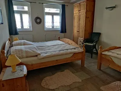 Ein Bett oder Betten in einem Zimmer der Unterkunft Pension Grenzeck Sommerfrische