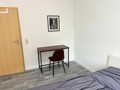 Ein Bett oder Betten in einem Zimmer der Unterkunft Modern Work & Relax Apartment