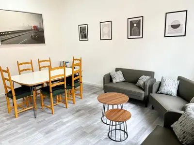 Ein Sitzbereich in der Unterkunft Modern Work & Relax Apartment