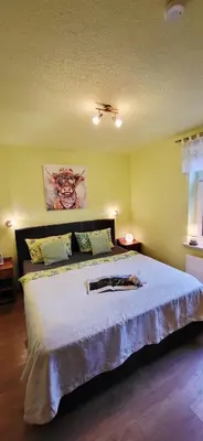 Ein Bett oder Betten in einem Zimmer der Unterkunft Ferienhaus Rumpelt