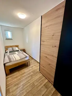Ein Bett oder Betten in einem Zimmer der Unterkunft Ferienwohnung Gerdi