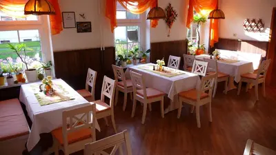 Ein Restaurant oder anderes Speiselokal in der Unterkunft Werners Landgasthaus