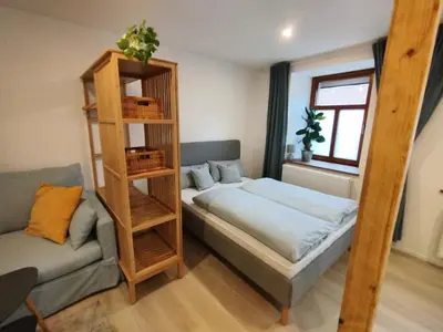 Ein Bett oder Betten in einem Zimmer der Unterkunft Angernest, Ferienwohnung in Kamenz