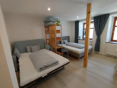 Ein Bett oder Betten in einem Zimmer der Unterkunft Angernest, Ferienwohnung in Kamenz