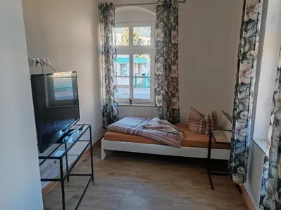 Ein Bett oder Betten in einem Zimmer der Unterkunft Elbe Quartier Meißen TOP MONTEURUNTERKÜNFTE Appartement 5 rechts