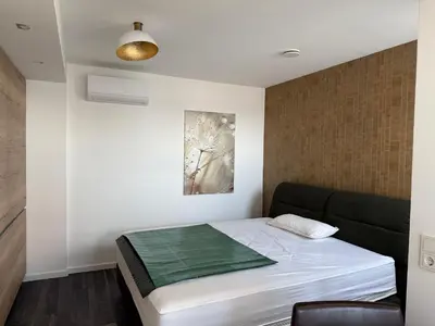 Ein Bett oder Betten in einem Zimmer der Unterkunft Ferienhaus Lakoma